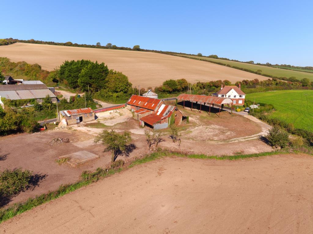 Lot: 27 - FOUR ACRES WITH BARNS FOR CONVERSION AND CONSTRUCTION OF A SUBSTANTIAL NEW DWELLING - Aerial Shot